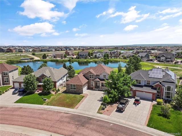 12404 Pine Valley Cir, Peyton, CO 80831 - aerial perspective of suburban area featuring a nearby body of water
