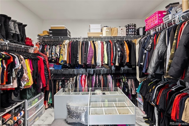 12404 Pine Valley Cir, Peyton, CO 80831 - spacious closet with marble look tile flooring