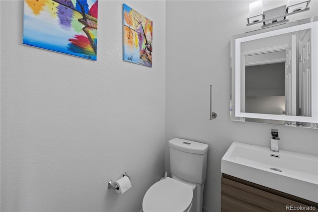 12404 Pine Valley Cir, Peyton, CO 80831 - half bathroom with vanity and toilet