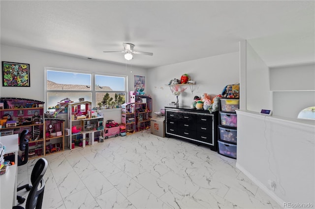 12404 Pine Valley Cir, Peyton, CO 80831 - recreation room featuring ceiling fan and marble look tile flooring