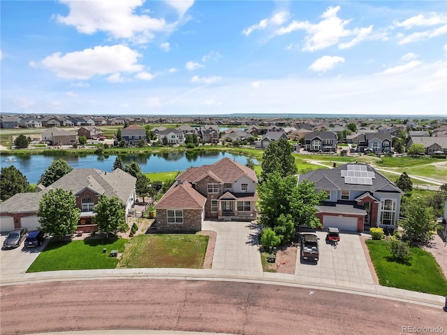 12404 Pine Valley Cir, Peyton, CO 80831 - aerial view of residential area featuring a large body of water