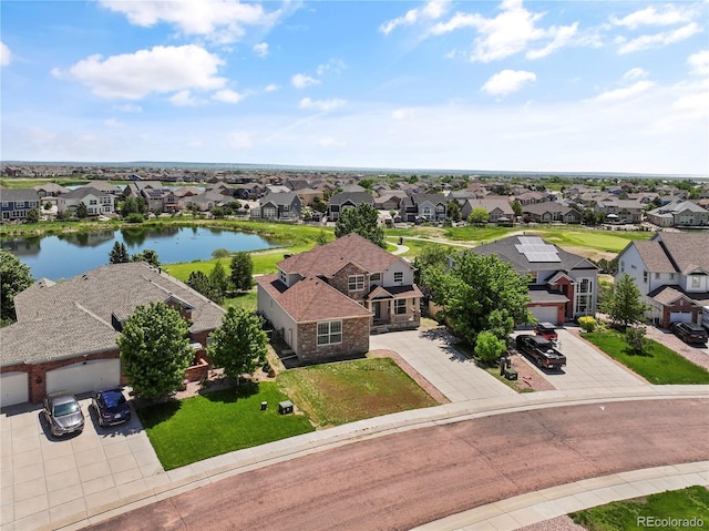 12404 Pine Valley Cir, Peyton, CO 80831 - aerial view of residential area with a nearby body of water