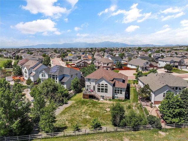 12404 Pine Valley Cir, Peyton, CO 80831 - aerial perspective of suburban area with mountains