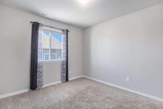 unfurnished room with carpet