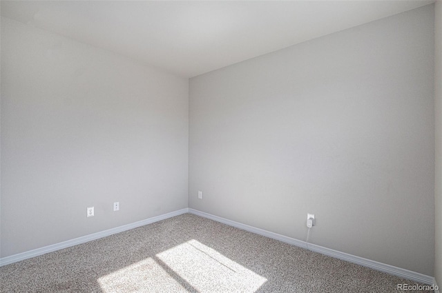 spare room with carpet floors