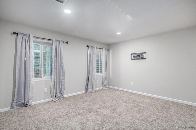 unfurnished room featuring carpet floors