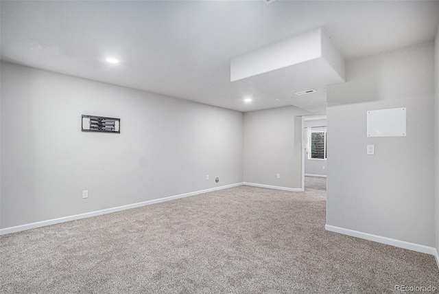 unfurnished room with carpet flooring