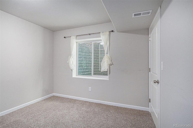 spare room with carpet flooring