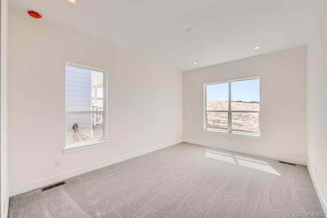 view of carpeted spare room