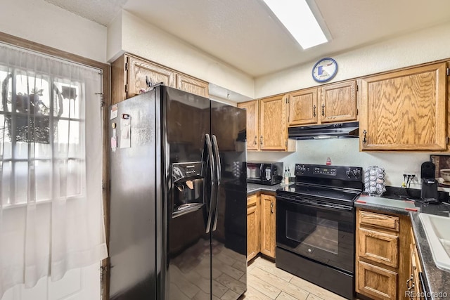 kitchen with black appliances