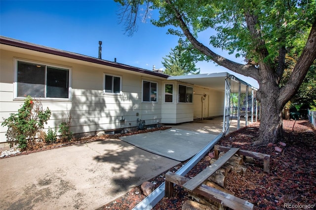 back of house featuring a patio area