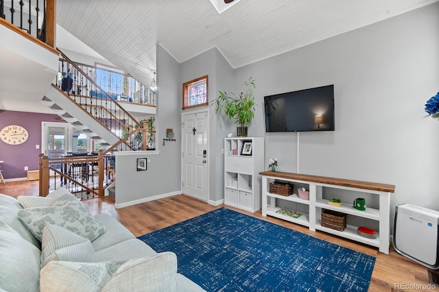 8544 S Upham Way, Littleton, CO 80128 - living room featuring wood finished floors, stairway, high vaulted ceiling, and wood ceiling