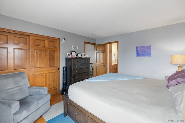 8544 S Upham Way, Littleton, CO 80128 - bedroom with light wood finished floors