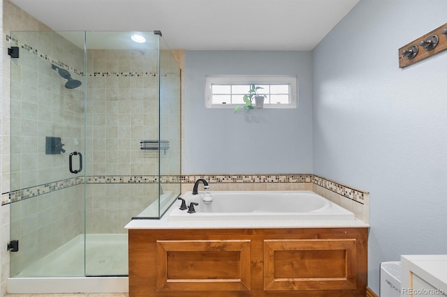 8544 S Upham Way, Littleton, CO 80128 - bathroom featuring a garden tub and a shower stall