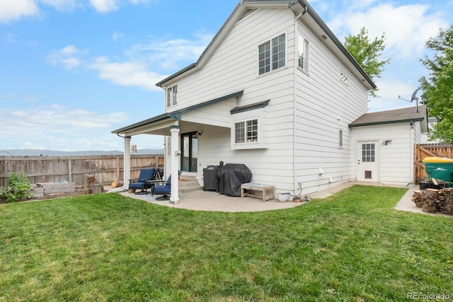 8544 S Upham Way, Littleton, CO 80128 - back of house featuring a patio and entry steps