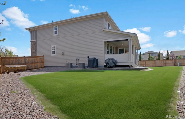 rear view of property featuring central air condition unit