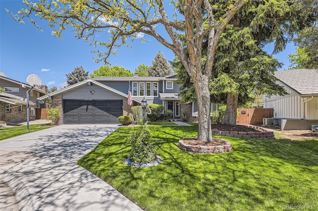 6338 S Oneida Ct, Centennial, CO 80111 - view of front of home featuring brick siding, concrete driveway, a garage, and central AC