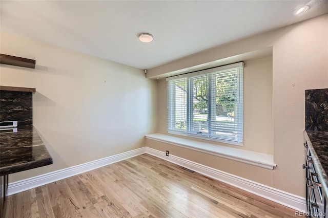 6338 S Oneida Ct, Centennial, CO 80111 - unfurnished dining area with baseboards and wood finished floors