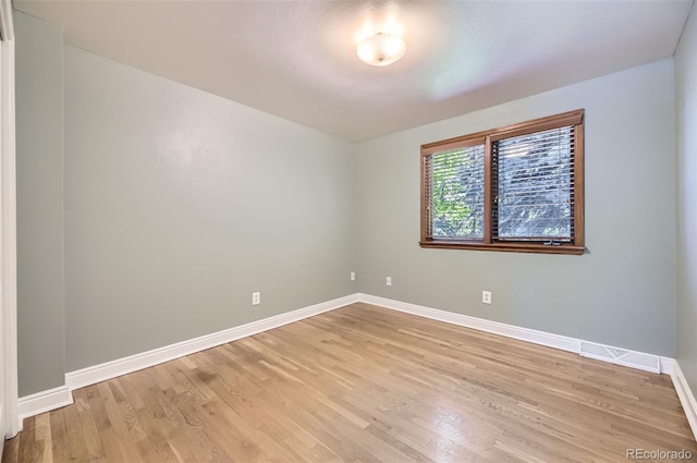 6338 S Oneida Ct, Centennial, CO 80111 - unfurnished room with light wood-style floors and baseboards