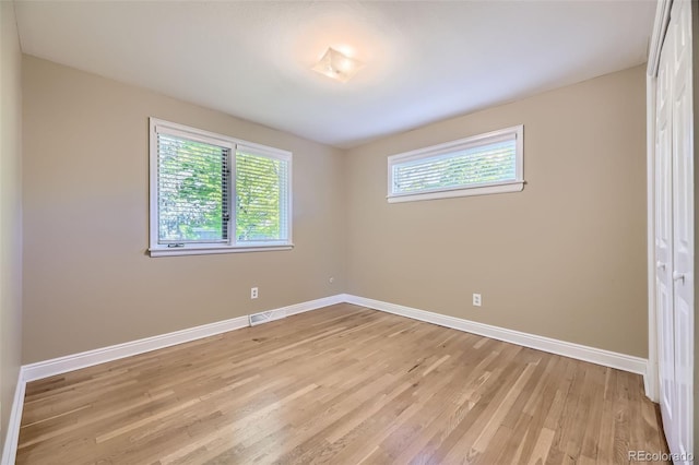 6338 S Oneida Ct, Centennial, CO 80111 - unfurnished room featuring baseboards and light wood-style flooring