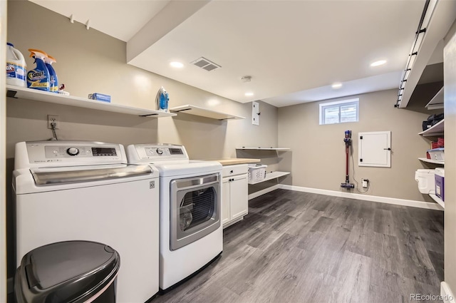 6338 S Oneida Ct, Centennial, CO 80111 - laundry area with dark wood-style flooring, separate washer and dryer, baseboards, recessed lighting, and cabinet space