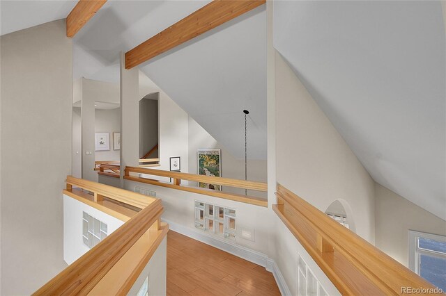 29433 Firethorne Ct, Evergreen, CO 80439 - hall with wood finished floors, an upstairs landing, and baseboards