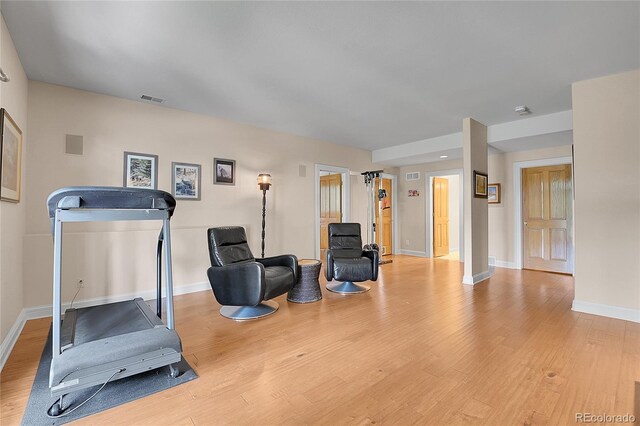 29433 Firethorne Ct, Evergreen, CO 80439 - sitting room with light wood-style flooring and baseboards