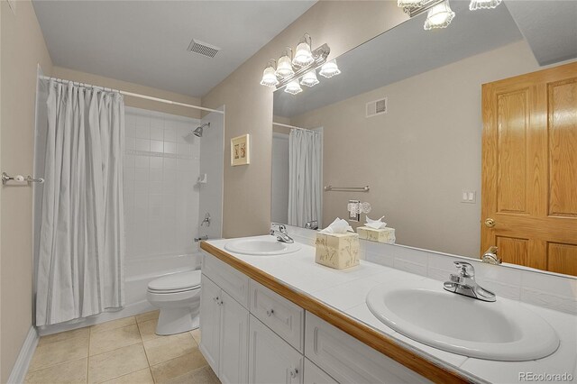 29433 Firethorne Ct, Evergreen, CO 80439 - bathroom featuring double vanity, shower / tub combo, toilet, and tile patterned floors