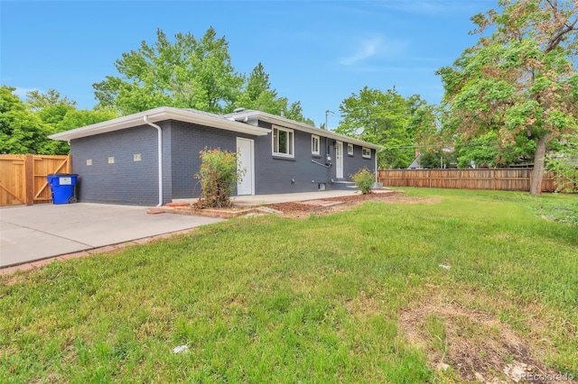 2598 Teller St, Lakewood, CO 80214 - view of front facade featuring brick siding