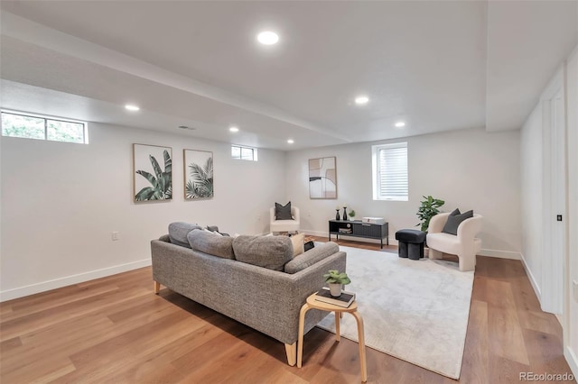 2598 Teller St, Lakewood, CO 80214 - living area with recessed lighting, light wood-style floors, baseboards, and plenty of natural light