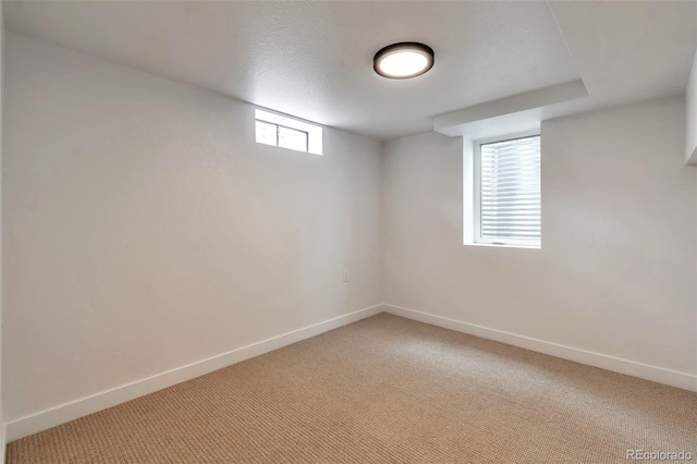 2598 Teller St, Lakewood, CO 80214 - spare room with baseboards and light colored carpet