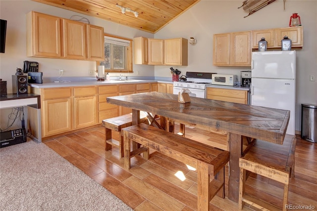 kitchen featuring wooden ceiling, light hardwood / wood-style flooring, lofted ceiling, white appliances, and light brown cabinetry