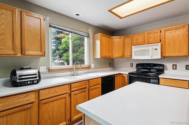 2780 S Cathay Ct, Aurora, CO 80013 - kitchen featuring black appliances and light countertops