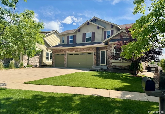 24714 E Quarto Pl, Aurora, CO 80016 - view of front of house featuring a garage, concrete driveway, a front yard, and stone siding