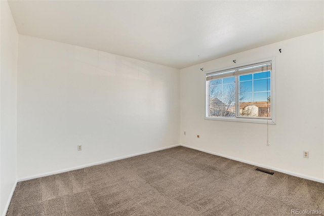 empty room featuring carpet