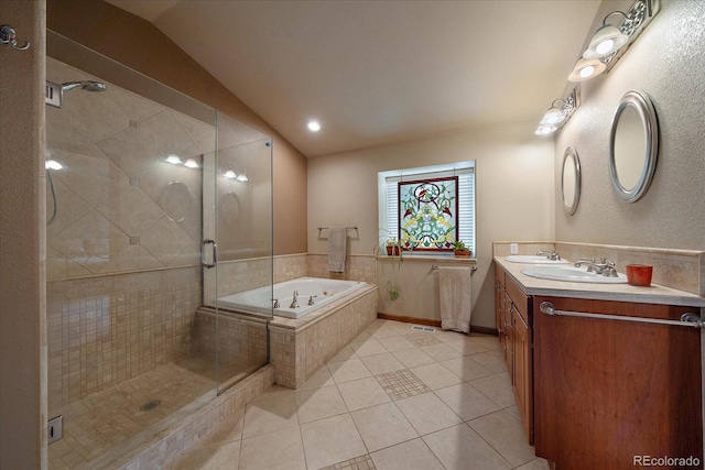 bathroom featuring tile patterned floors, vanity, shower with separate bathtub, and lofted ceiling