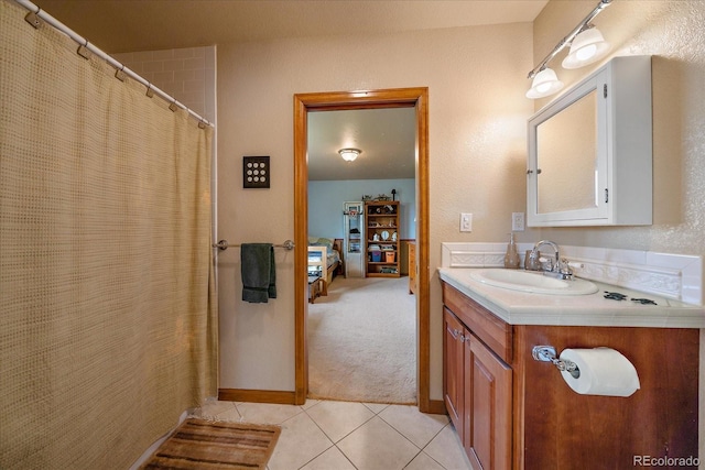 bathroom featuring vanity and tile patterned flooring