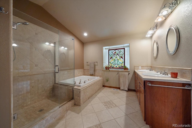 5861 E Valley Hi Dr, Parker, CO 80138 - full bath with tile patterned flooring, vanity, a bath, vaulted ceiling, and a shower stall