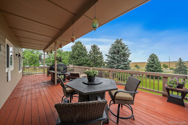 5861 E Valley Hi Dr, Parker, CO 80138 - wooden deck with outdoor dining space