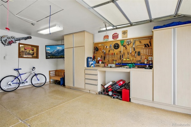 garage featuring a workshop area