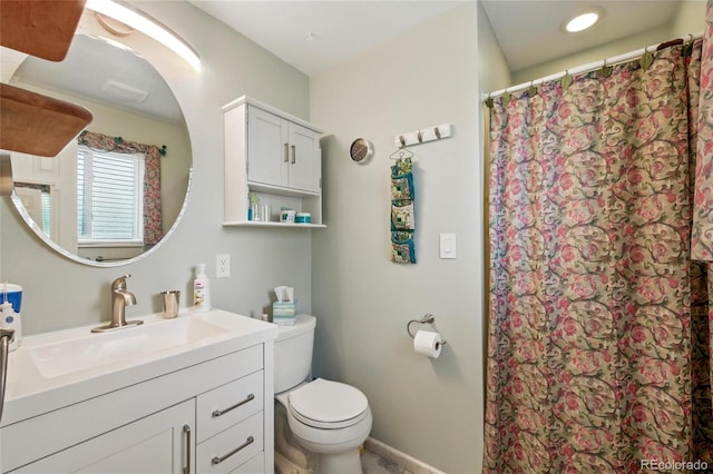 7472 Jay Ct, Arvada, CO 80003 - full bath featuring vanity, a shower with shower curtain, and toilet
