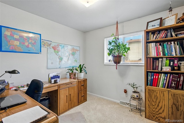 home office featuring visible vents, carpet flooring, and baseboards