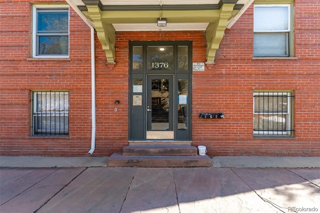 1376 N Pearl St Unit B1, Denver, CO 80203 - view of exterior entry with brick siding
