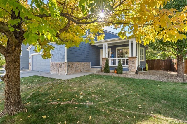 1540 Meachum Way, Erie, CO 80516 - view of front facade with a porch and stone siding
