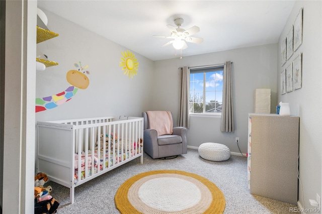 1540 Meachum Way, Erie, CO 80516 - bedroom with carpet flooring, a crib, baseboards, and a ceiling fan