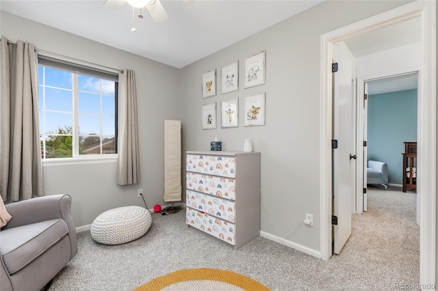 1540 Meachum Way, Erie, CO 80516 - living area with carpet flooring, baseboards, and ceiling fan