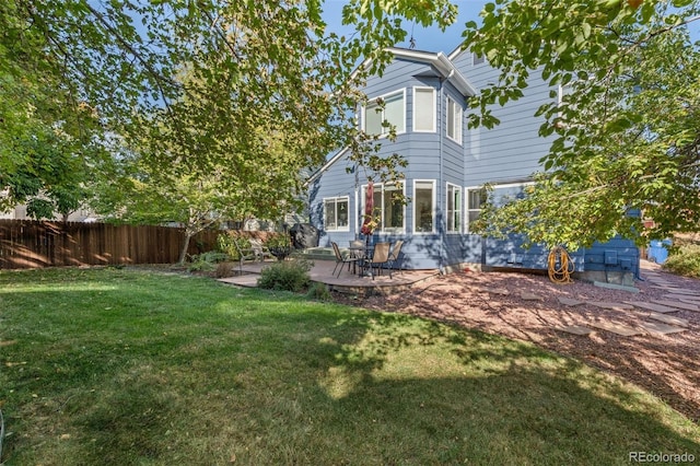1540 Meachum Way, Erie, CO 80516 - rear view of house featuring a patio