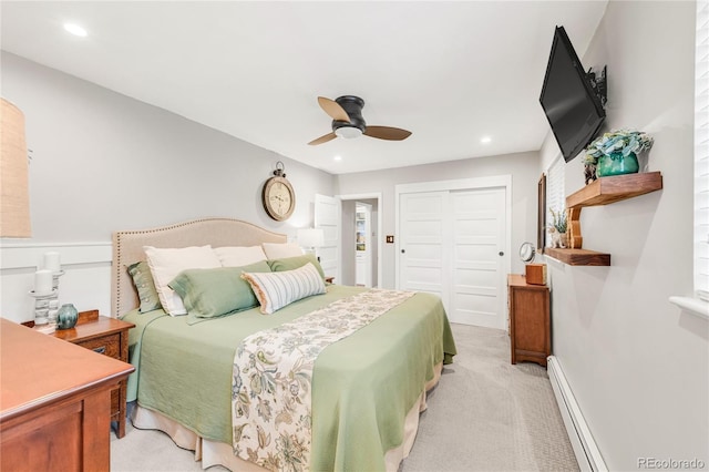 3317 Harlan St, Wheat Ridge, CO 80033 - bedroom with a closet, a baseboard radiator, light colored carpet, recessed lighting, and a ceiling fan