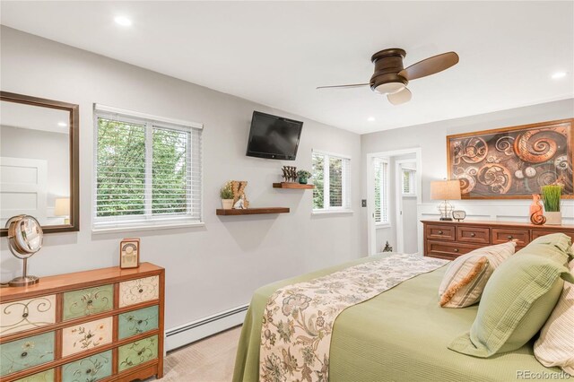 3317 Harlan St, Wheat Ridge, CO 80033 - carpeted bedroom featuring a baseboard heating unit, recessed lighting, and a ceiling fan