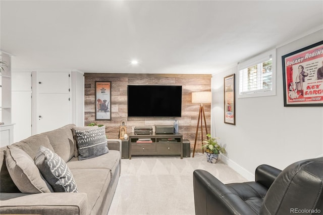 3317 Harlan St, Wheat Ridge, CO 80033 - living area with an accent wall, carpet flooring, baseboards, and wooden walls